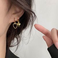 Korean Style  Hot Sale Gold Retro Asymmetric Love Heart Earrings Same Style All-matching Temperament Female Earrings sku image 1