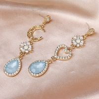 Femmes Glamour Lune Goutte D'eau Forme De Cœur Alliage Des Boucles D'oreilles Strass Artificiels Perles Artificielles Boucles D'oreilles main image 1