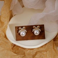 Women's Sweet Bow Knot Alloy Rhinestones Earrings Pearl Metal Diamond Stud Earrings main image 6