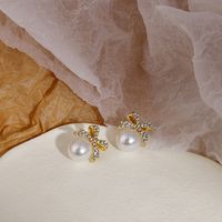 Women's Sweet Bow Knot Alloy Rhinestones Earrings Pearl Metal Diamond Stud Earrings main image 4