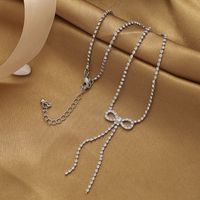 Frau Mode Einfacher Stil Bogenknoten Legierung Halskette Quaste Künstliche Strasssteine Halsketten main image 3