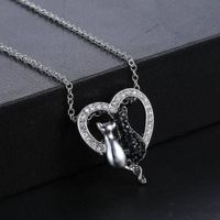 Fashion Ornament Black And White Cat Heart Shaped Pendant Alloy Necklace main image 3