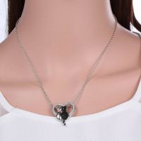 Fashion Ornament Black And White Cat Heart Shaped Pendant Alloy Necklace main image 4