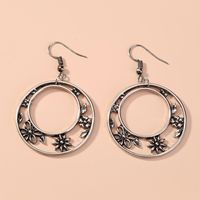 Fashion Retro Simple Geometric Snowflake Flower Alloy Earrings main image 2