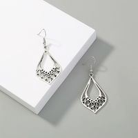 Mode Rétro Simple Creux Gouttes D'eau Forme Alliage Boucles D'oreilles main image 1