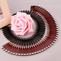 Simple Style Solid Color Plastic Resin Rhinestone Hair Combs main image 5