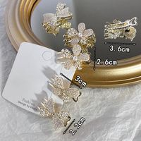 Sweet Flower Butterfly Bow Knot Alloy Pearl Plating Hair Clip main image 4