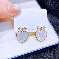 New Korean S925 Silver Needle Natural Shell Heart-shaped Zircon Bow Earrings For Women sku image 1