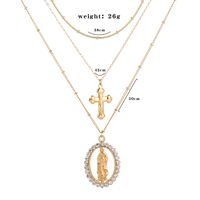 Fashion Retro Diamond-embedded Lady Cross Oval Pendant Multi-layer Alloy Necklace main image 5