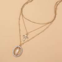 Fashion Retro Diamond-embedded Lady Cross Oval Pendant Multi-layer Alloy Necklace main image 1