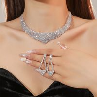 Frau Luxus Mode Asymmetrisch Raute Legierung Strass Steine Ohrringe Halskette Schmuck-set Überzug Diamant Strass Steine main image 2