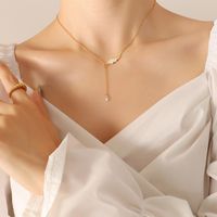 Frau Mode Einfacher Stil Quasten Titan Stahl Künstliche Perlen Halskette main image 2