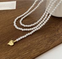 Fashion Retro Style Heart Pendant Multi-layer Pearl Necklace Titanium Steel Clavicle Chain sku image 1