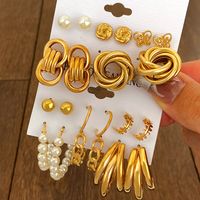 Fashion Geometric Heart Shape Butterfly Imitation Pearl Alloy Plating Rhinestone Earrings main image 1