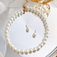 Klassischer Stil Geometrisch Imitationsperle Perlen Halskette 2-teiliges Set main image 1