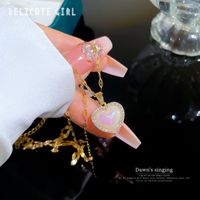 Acier Au Titane Le Cuivre Mode Star Chaîne Diamant Forme De Cœur Perles Artificielles Collier main image 4