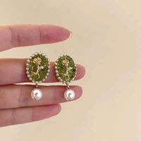 Vintage Style Oval Flower Alloy Inlay Artificial Pearls Ear Studs main image 1