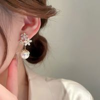 Wholesale Jewelry 1 Pair Sweet Flower Artificial Pearl Copper Zircon Drop Earrings Ear Clips main image 5