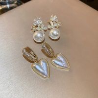 Wholesale Jewelry 1 Pair Sweet Flower Artificial Pearl Copper Zircon Drop Earrings Ear Clips main image 1