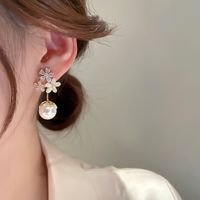 Wholesale Jewelry 1 Pair Sweet Flower Artificial Pearl Copper Zircon Drop Earrings Ear Clips main image 2