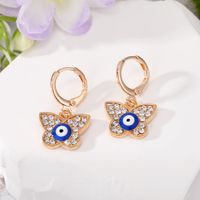 Wholesale Jewelry 1 Pair Retro Devil's Eye Butterfly Alloy Rhinestones Drop Earrings main image 4