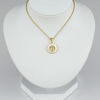 Simple Style Letter Stainless Steel Pendant Necklace Plating Hollow Out Shell Stainless Steel Necklaces main image 2