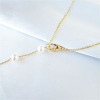 Simple Style Fish Tail Artificial Pearl Alloy Inlay Rhinestones Necklace main image 4