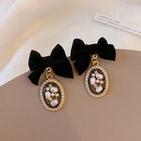 Elegant Bow Knot Inlay Alloy Pearl Drop Earrings main image 3