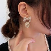Elegant Bow Knot Inlay Alloy Pearl Drop Earrings main image 2