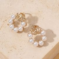 Sweet Flower Alloy Hollow Out Pearl Women's Ear Studs 1 Pair main image 4