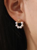 Sweet Flower Alloy Hollow Out Pearl Women's Ear Studs 1 Pair main image 3
