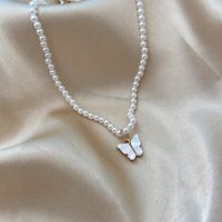 Simple Style Bow Knot Imitation Pearl Inlay Shell Necklace main image 2