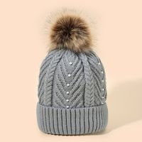 Women's Fashion Solid Color Pom Poms Pearl Wool Cap main image 4