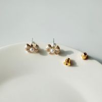 Simple Style Bow Knot Alloy Enamel Artificial Pearls Ear Studs main image 1