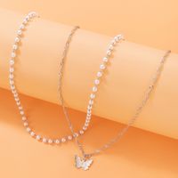 Simple Style Butterfly Alloy Artificial Pearls Women's Layered Necklaces main image 5
