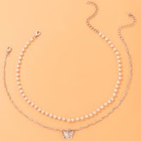 Simple Style Butterfly Alloy Artificial Pearls Women's Layered Necklaces main image 6