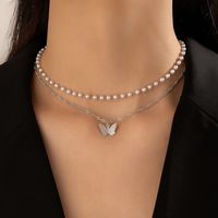 Simple Style Butterfly Alloy Artificial Pearls Women's Layered Necklaces main image 9