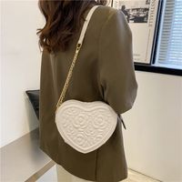 Femmes Moyen Faux Cuir Couleur Unie Vêtement De Rue En Forme De Coeur Fermeture Éclair Sac Bandoulière main image 1