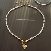 French Style Hand Heart Shape Titanium Steel Pendant Necklace Gold Plated Pearl Stainless Steel Necklaces main image 5