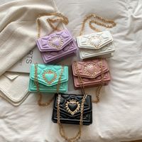 Women's Small Pu Leather Heart Shape Solid Color Fashion Square Magnetic Buckle Crossbody Bag main image 1