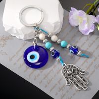 Simple Style Devil's Eye Palm Alloy Glass Plating Bag Pendant Keychain 1 Piece main image 4
