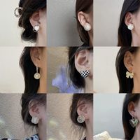 Fashion Flower Alloy Inlay Artificial Gemstones Pearl Women's Ear Studs 1 Pair main image 4