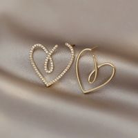1 Pair Fashion Heart Shape Alloy Asymmetrical Hollow Out Inlay Rhinestones Women's Drop Earrings main image 4