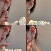 Fashion Geometric Heart Shape Bow Knot Copper Inlay Artificial Pearls Rhinestones Earrings 1 Pair main image 2