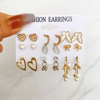 Fashion Heart Shape Bow Knot Alloy Inlay Artificial Pearls Zircon Women's Drop Earrings Ear Studs 1 Set main image 1