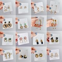 Fashion Round Alloy Asymmetrical Pearl Plating Women's Drop Earrings 1 Pair main image 1