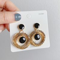 Fashion Round Alloy Asymmetrical Pearl Plating Women's Drop Earrings 1 Pair main image 4