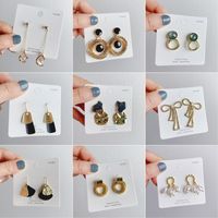 Fashion Round Alloy Asymmetrical Pearl Plating Women's Drop Earrings 1 Pair main image 3