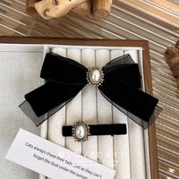 Mode Bogenknoten Tuch Inlay Künstliche Perlen Strasssteine Haarklammer 1 Stück main image 1