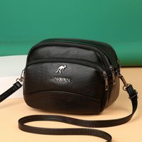 Women's Medium Pu Leather Solid Color Fashion Oval Zipper Crossbody Bag main image 4